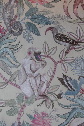 a painting of birds on a floral wallpaper at Ca' della Scimmia - Rialto Bridge, Venice in Venice