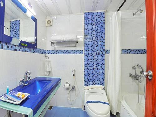 Ένα μπάνιο στο Hotel Ponmari residencyy