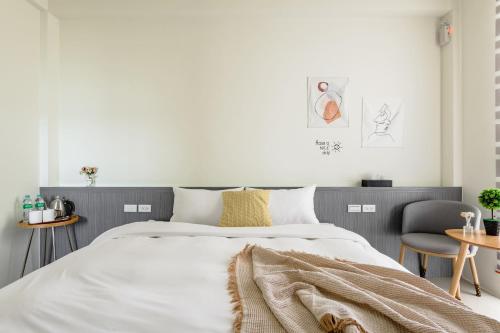 Postel nebo postele na pokoji v ubytování Mini House B&B