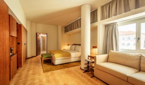 Ένα ή περισσότερα κρεβάτια σε δωμάτιο στο Ceuta Terrace Suites