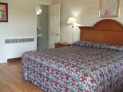 Postel nebo postele na pokoji v ubytování Robin Hood Motel