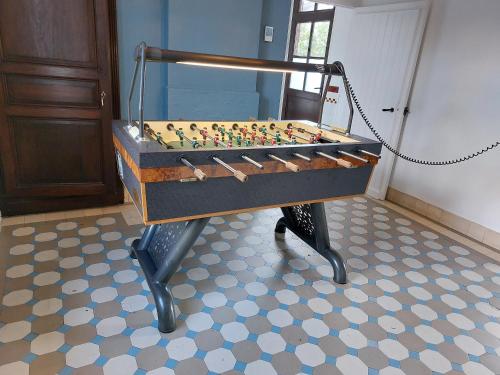 a chess board on a table in a room at Les Lilas in Sart-en-Fagne