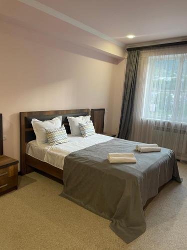 Katil atau katil-katil dalam bilik di Mina Hotel