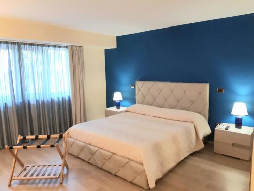 Posteľ alebo postele v izbe v ubytovaní B&B Villa Emanuel