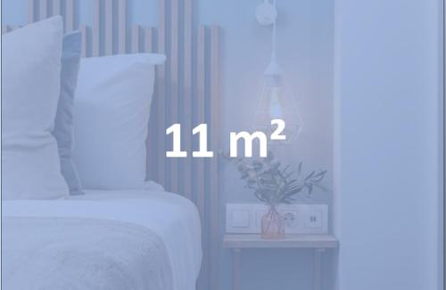 a picture of a room with a bed and a clock at Linda Boutique Hotel in Marbella