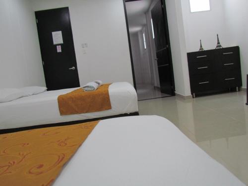Postel nebo postele na pokoji v ubytování Hotel Diamonds