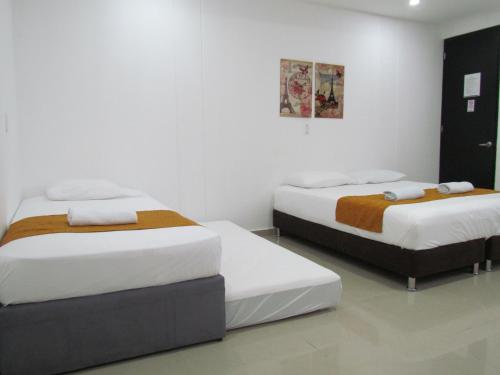 Postel nebo postele na pokoji v ubytování Hotel Diamonds