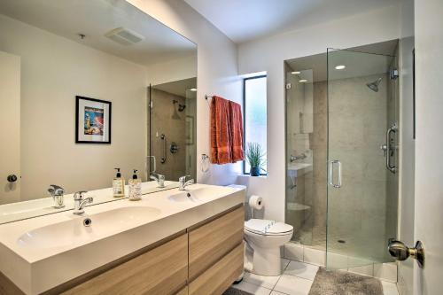 a bathroom with a sink and a toilet and a shower at Palm Springs Retreat with Pool Access, Near Downtown in Palm Springs