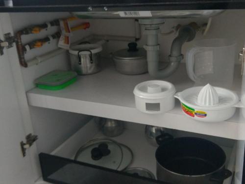 a kitchen counter with a sink and some dishes at MIRADOR TUNJA 401 in Tunja