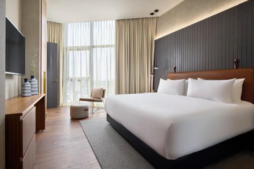 Ένα ή περισσότερα κρεβάτια σε δωμάτιο στο Xoma by Viadora