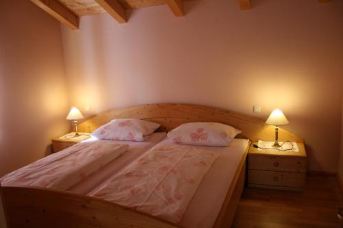 Кровать или кровати в номере Haus Schwarz