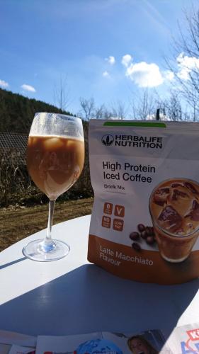 a glass of coffee and a box of high proteinoked coffee at Gasthaus Piesau - Thüringer Wald - Rennsteig in Piesau