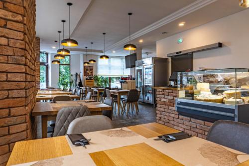 Rosso Aparthotelにあるレストランまたは飲食店