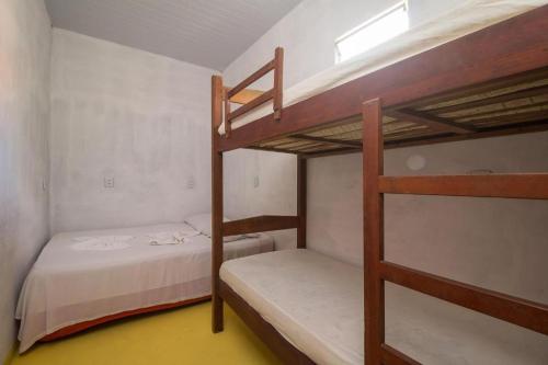 Postel nebo postele na pokoji v ubytování Hostel Em Boas Mãos