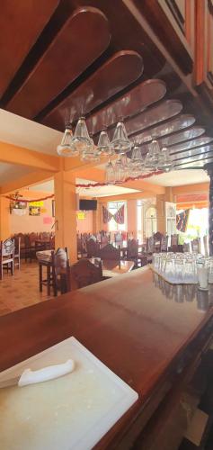 Een restaurant of ander eetgelegenheid bij Hotel El Rancherito