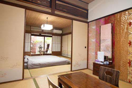Llit o llits en una habitació de Hostel Ayame