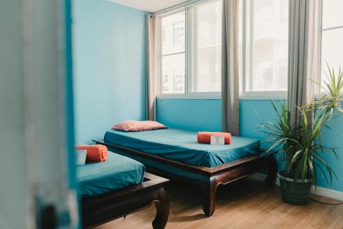Säng eller sängar i ett rum på Polynesian Hostel Beach Club