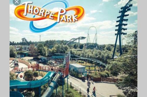 a ride at a theme park with a roller coaster at Windsor Town Centre Victorian townhouse sleeps 6 in Windsor
