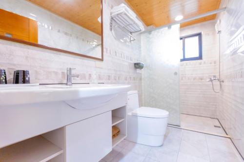 Koupelna v ubytování Yi Le Homestay