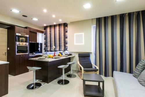Foto Rhodes Central Suite 1
