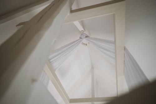 a close up of a white ceiling at Maison Durieux in Limoges