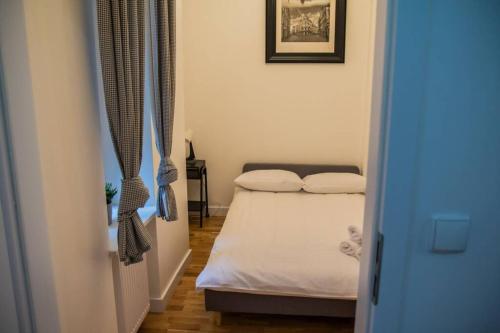 Posteľ alebo postele v izbe v ubytovaní Salonik u Kazimierza by Rentoom
