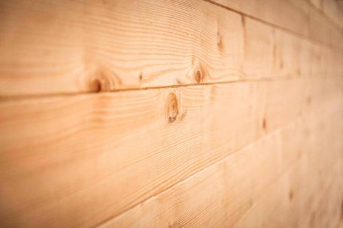 a close up of a wooden wall at Himmelreich-Chalets in Lam