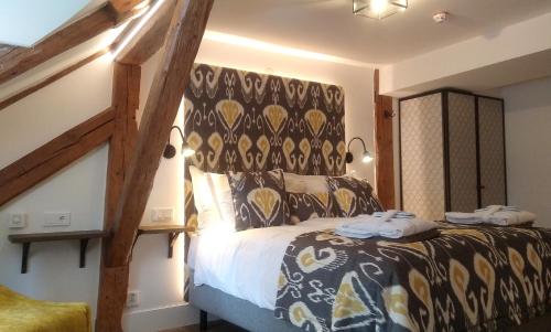 a bedroom with a large bed in a room at Hotel 1622 - Spa, Hotell & Konferens in Helsingborg