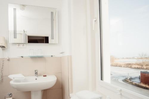 Hotel 'Das Strandhaus'にあるバスルーム