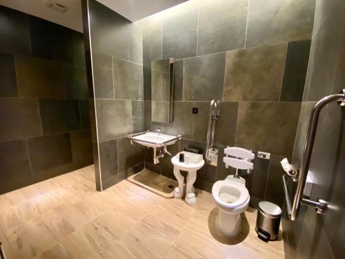 Ein Badezimmer in der Unterkunft VAHO Motel