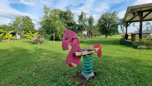 a sculpture of a horse in a park at Gaestehaus Gravell in Rust
