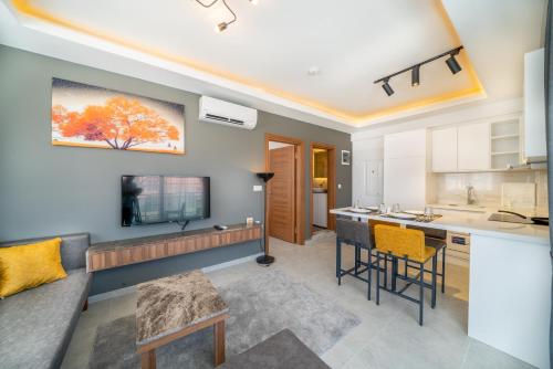 Η κουζίνα ή μικρή κουζίνα στο Midpoint Suites