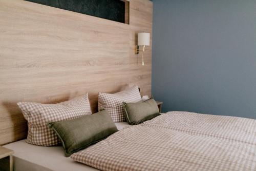 Postel nebo postele na pokoji v ubytování Hotel Vogtareuther-Hof