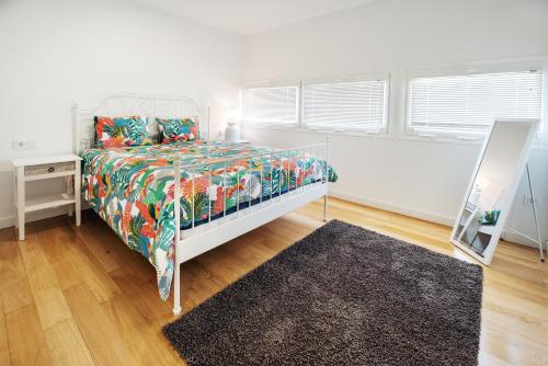 A bed or beds in a room at Lanzahost Monavista