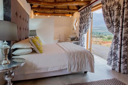 Katil atau katil-katil dalam bilik di Swartberg Country Manor