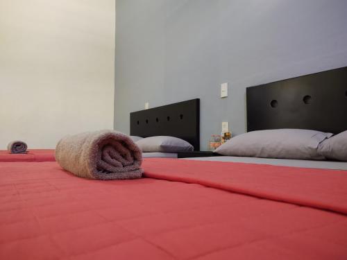Ένα ή περισσότερα κρεβάτια σε δωμάτιο στο Hotel Zepeda