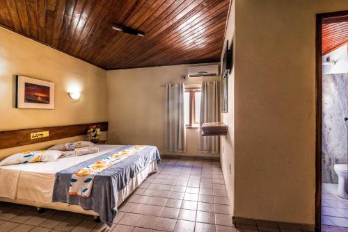 Postel nebo postele na pokoji v ubytování Hotel Costa Verde