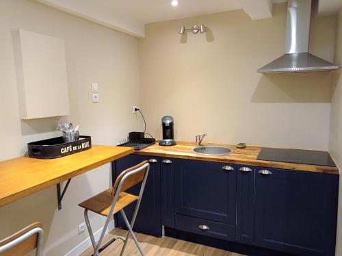 a kitchen with a sink and a counter top at OPERAPPART 4 in Toulon