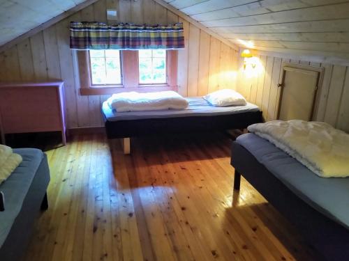 Postel nebo postele na pokoji v ubytování Hogstul Hytter - Gamlestua