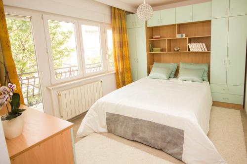 En eller flere senger på et rom på Apartments Sorić