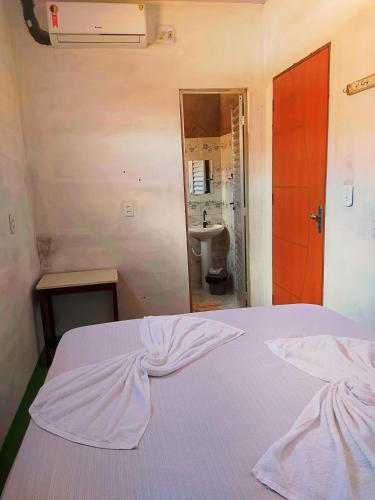 Postel nebo postele na pokoji v ubytování Hostel Em Boas Mãos