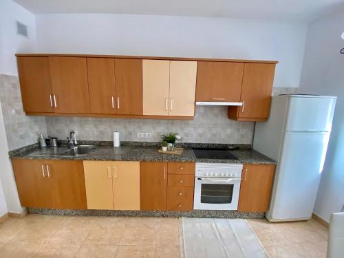 Kuchyňa alebo kuchynka v ubytovaní Namar apartamento
