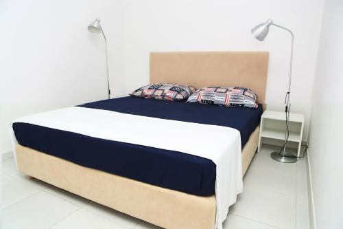 Postel nebo postele na pokoji v ubytování Apartments Grbin