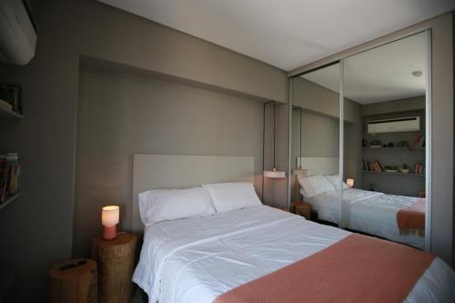 Posteľ alebo postele v izbe v ubytovaní Garden Point Luxury Apartments