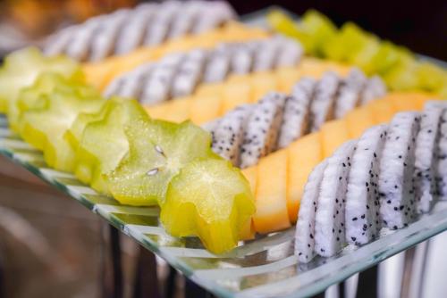 a bunch of cookies on a shelf with at Shenzhen L.gem Hotel in Shenzhen