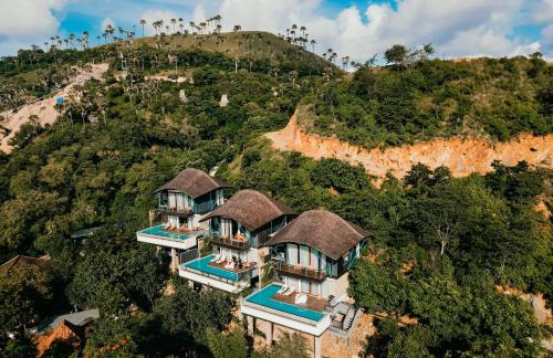 an aerial view of a house on a mountain at Plataran Komodo Resort & Spa - CHSE Certified in Labuan Bajo