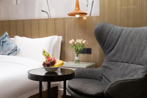 Posezení v ubytování Paco Hotel Gangding Metro Guangzhou-Free Shuttle Bus Service for Cantonfair 15Oct -4Nov