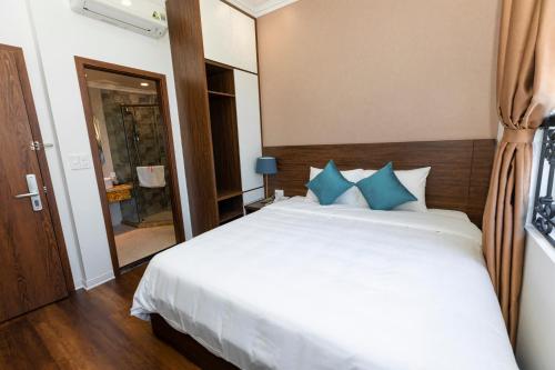 Katil atau katil-katil dalam bilik di Minh Phong Hotel Ha Long
