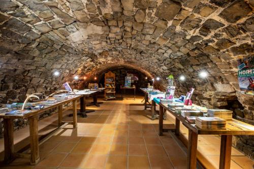 Restoranas ar kita vieta pavalgyti apgyvendinimo įstaigoje Camping RCN Val de Cantobre