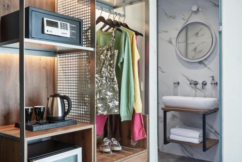 A kitchen or kitchenette at NLH KERAMEIKOS - Neighborhood Lifestyle Hotels